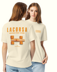 Front and back of a woman wearing cream t-shirt with 'Lacorsa Grand Prix Game' design with Orange top view Lacorsa car graphic