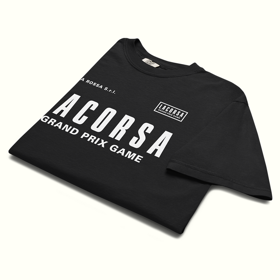 Folded black t-shirt with 'Lacorsa Grand Prix Game' white logotype on a white background