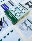 Lacorsa Grand Prix game box with race car pieces on top surrounded by cards on a light background