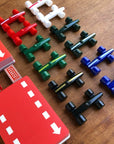 Eagle Blue, Cooper Green, Racing White, JPS Black, British Racing Green, Italian Racing Red plus Playing Cards and die